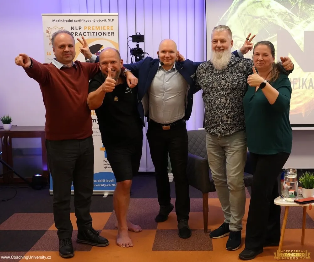 Skupina účastníků výcviku Coaching University